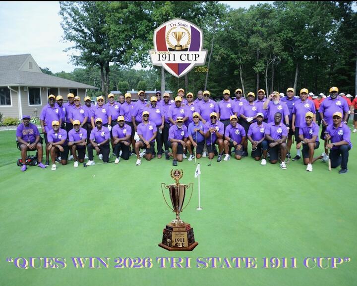 The Ques with the 2026 Cup on the putting green
